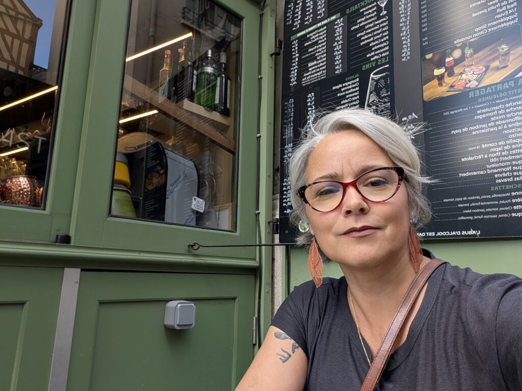 Selfie at Bar Jeanne d’Arc outside the Vieux Marché where Joan of Arc was burned at the stake.
